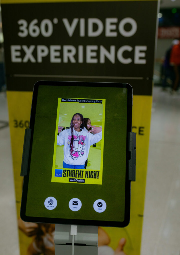 360 video photo booth experience signage at an event