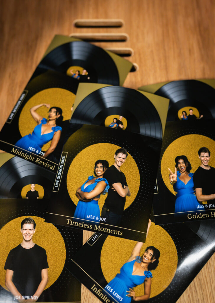 Heart shaped photo booth prints collected in a tray