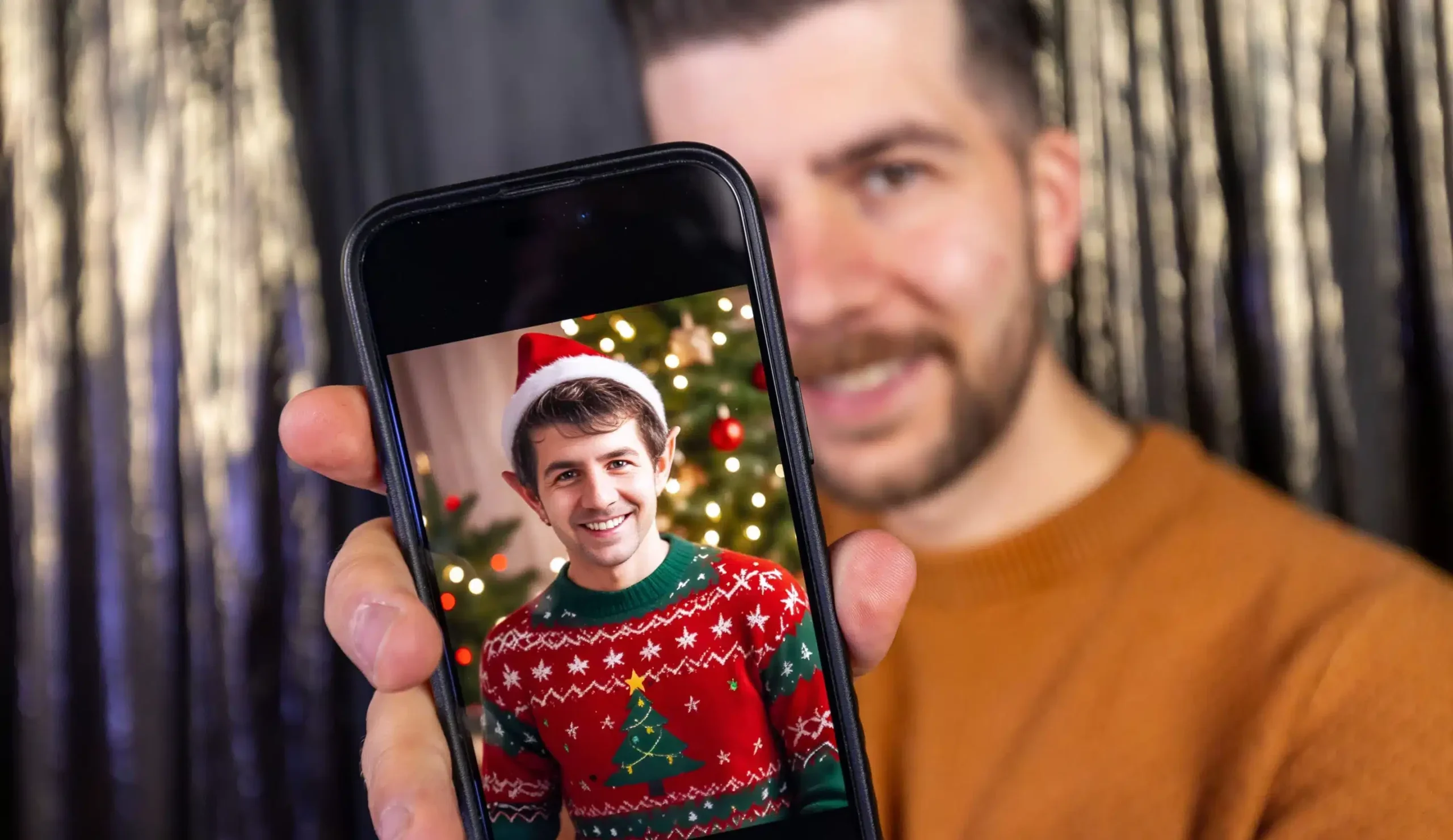 Guest viewing his photo booth picture on a phone