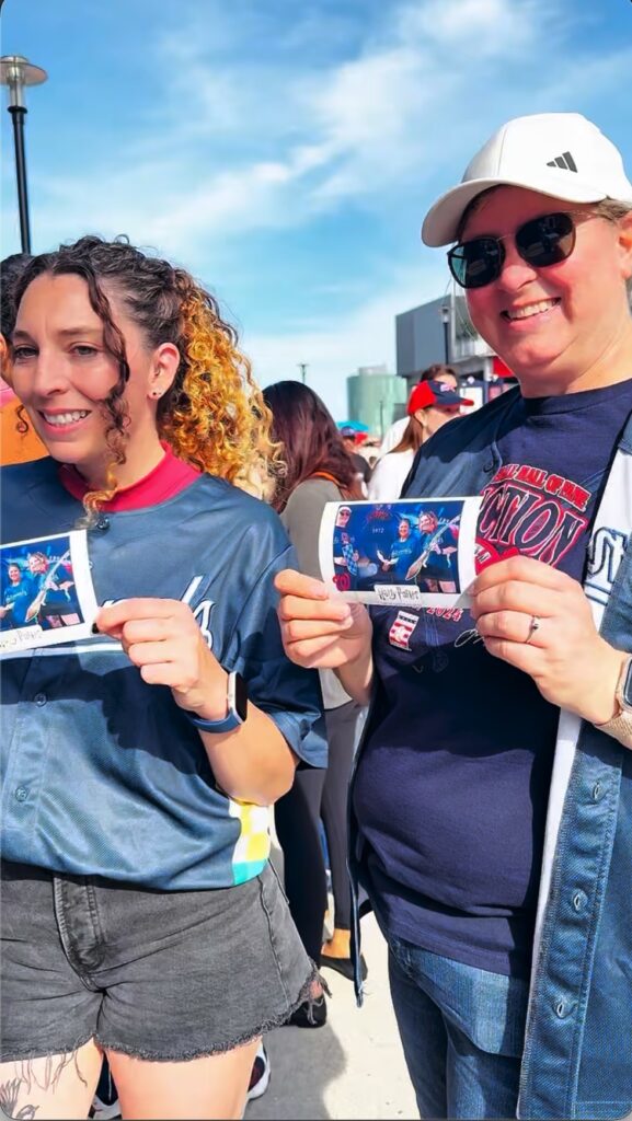 Guests at an outdoor event photo booth activation