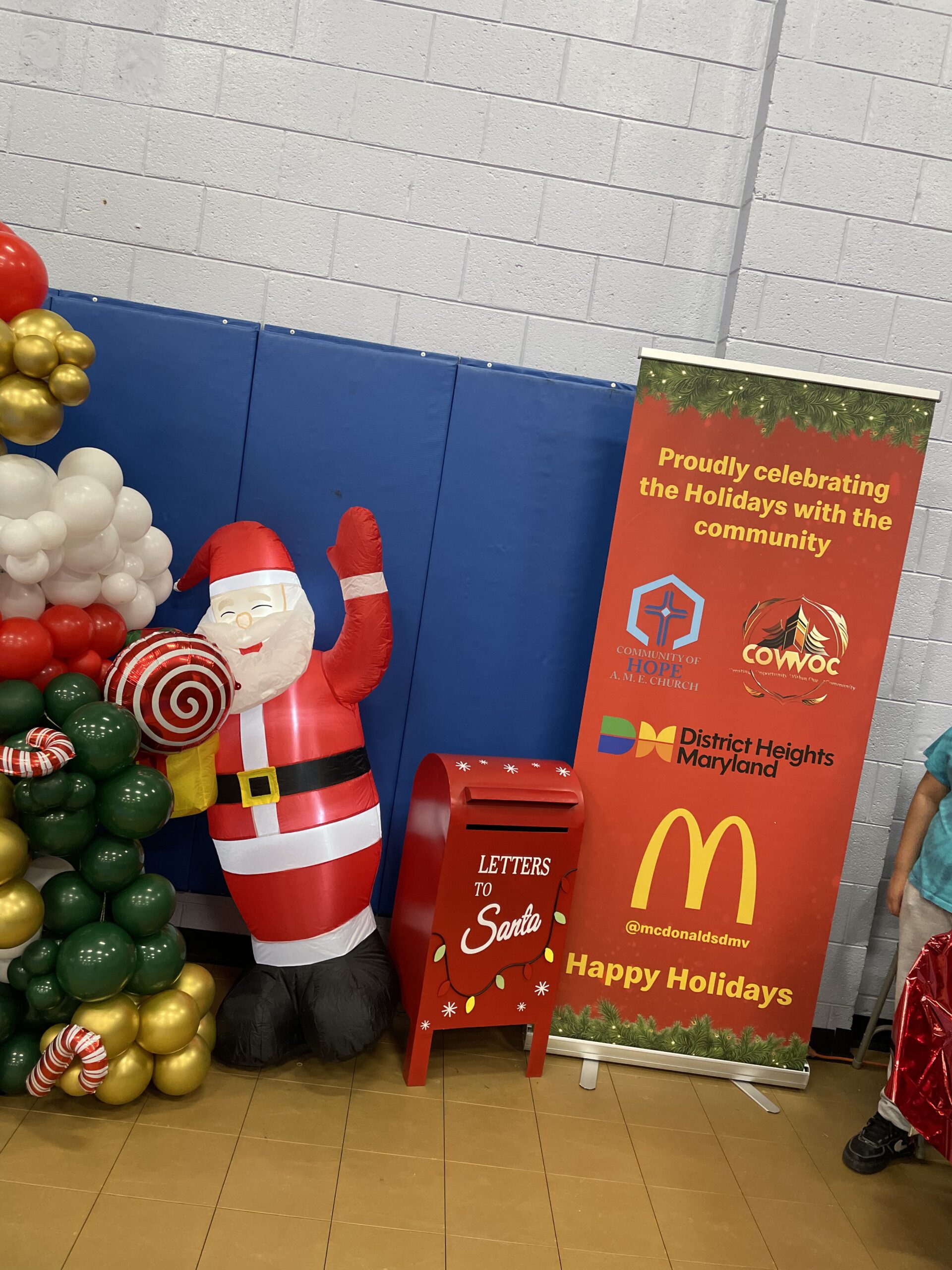Holiday themed photo booth activation with branded signage