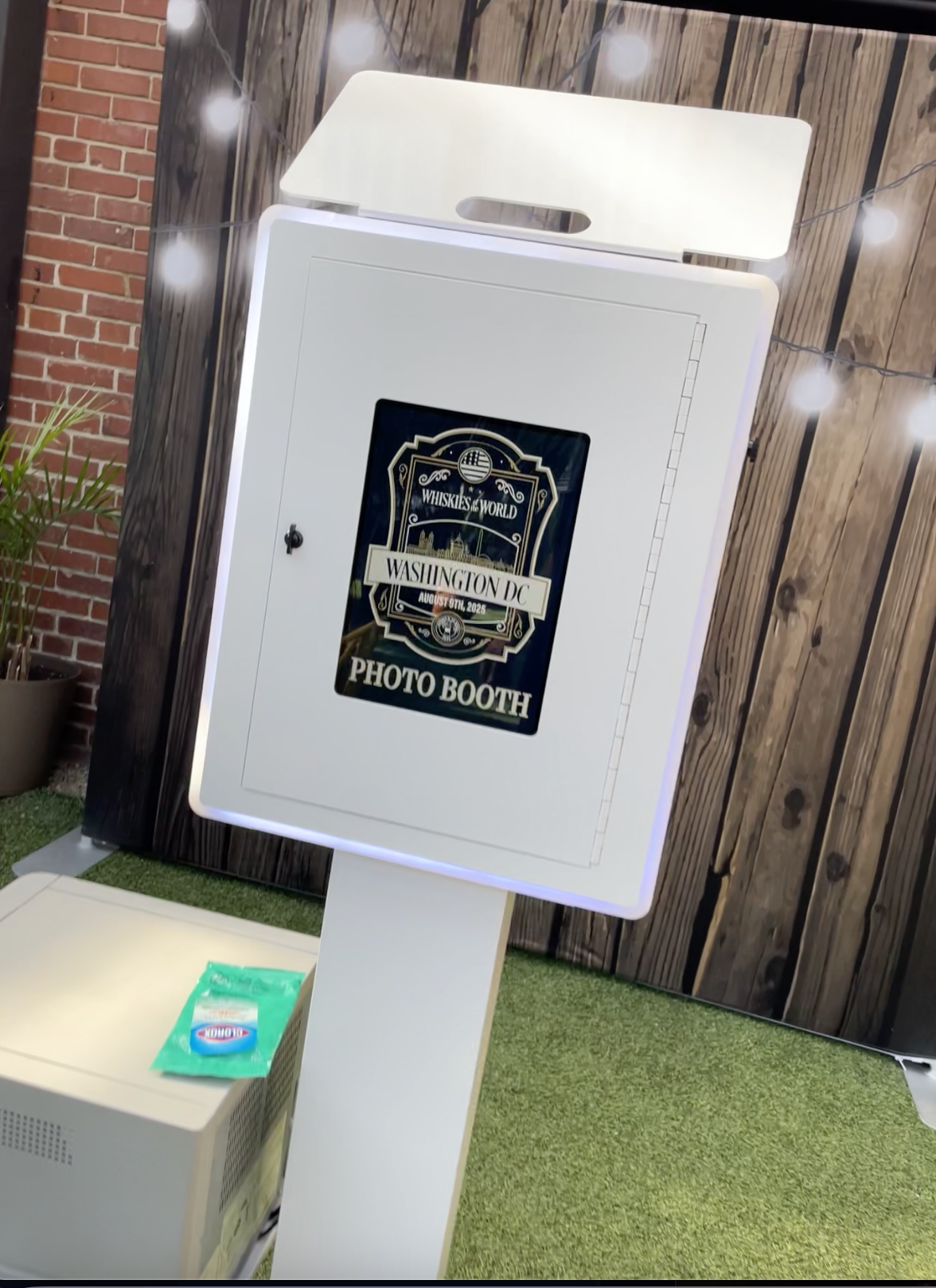 Open air photo booth set up outdoors for a private party