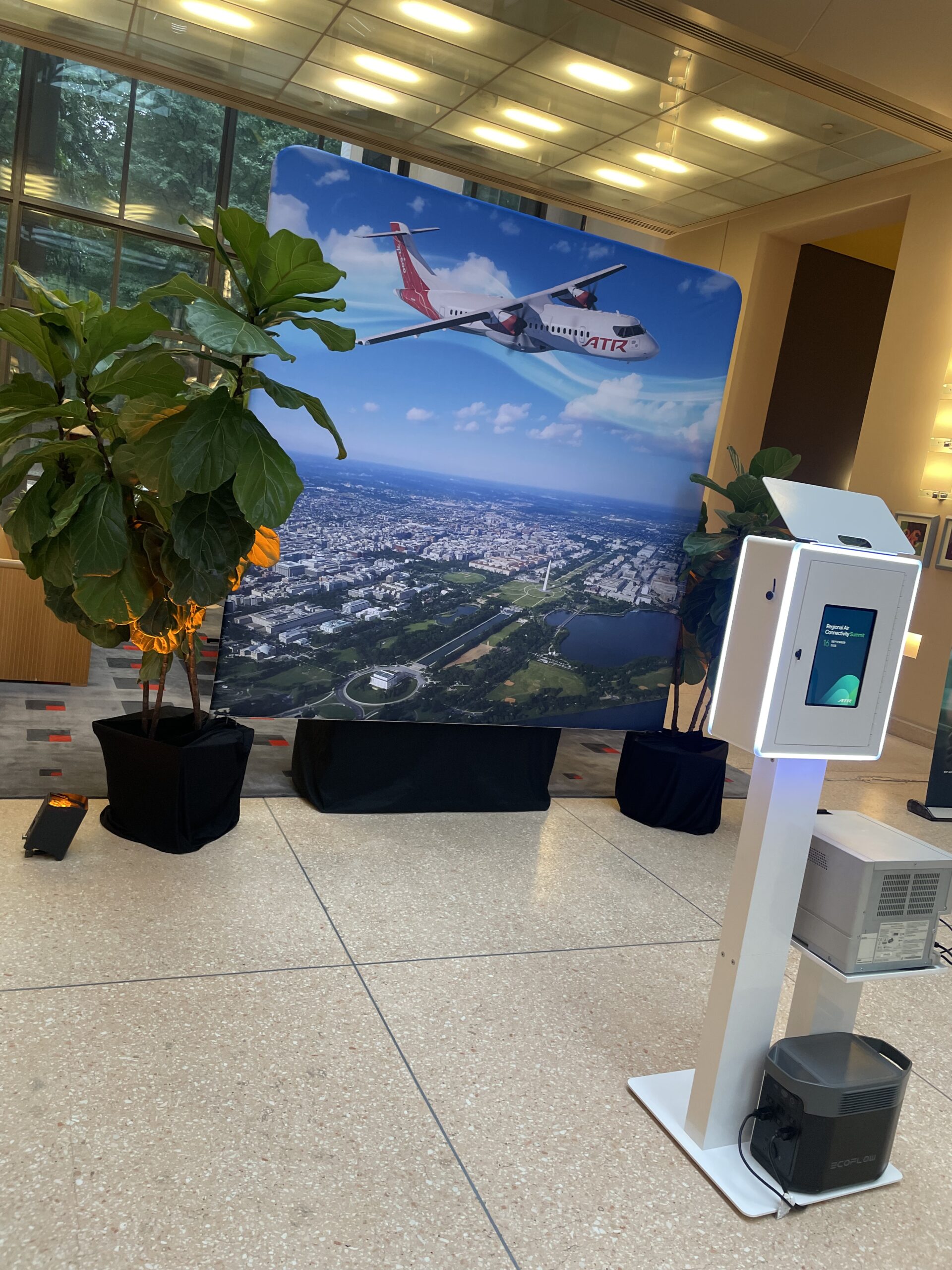 Branded photo booth set up in a corporate lobby in Washington DC