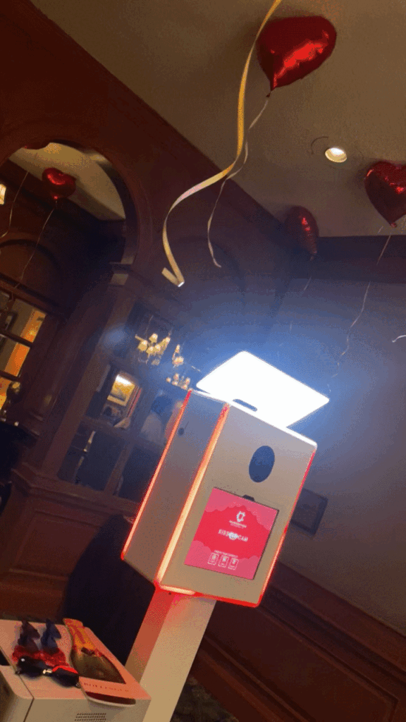 Custom branded photo booth at an evening event