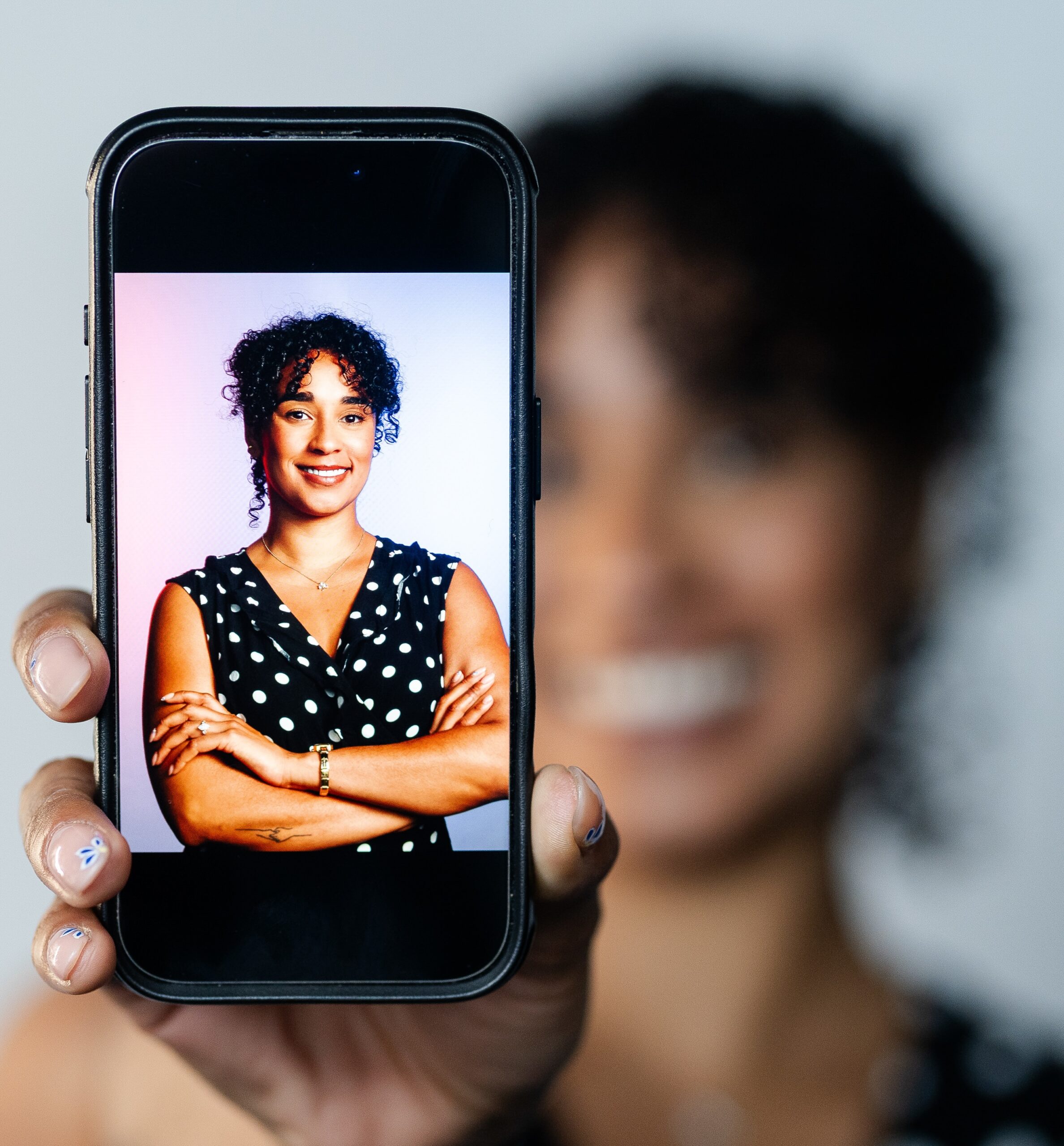 Guest viewing an instantly shared photo booth picture on a phone